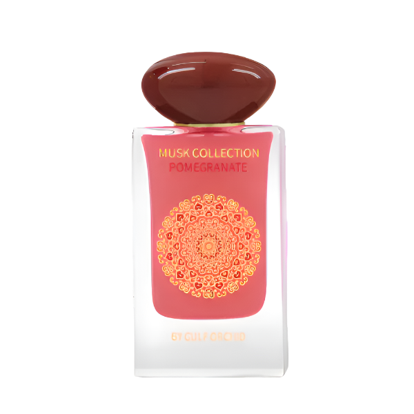 Musk Collection Pomegranate perfume by Gulf Orchid – elegant glass bottle with gold mandala design, surrounded by fresh ripe pomegranates, showcasing a fruity musk fragrance available at Parfum Zone Ke