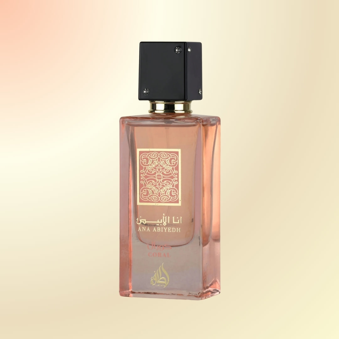 Ana abiyedh Coral perfume by Lattafa pink bottle 
