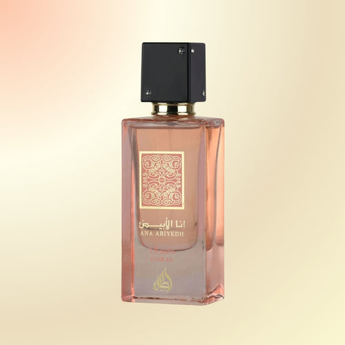 Ana abiyedh Coral perfume by Lattafa pink bottle 
