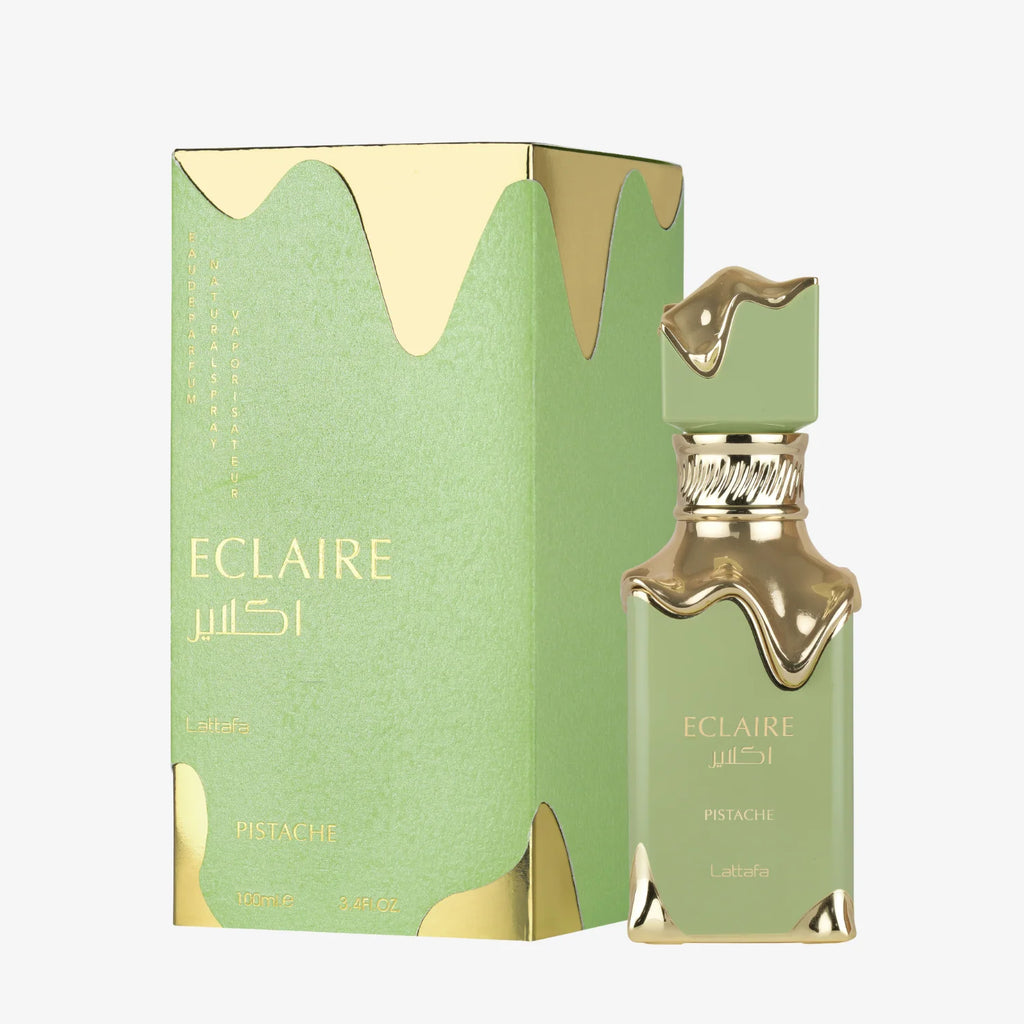 Eclaire Pistche perfume bottle and packaging with gold accents on a white background