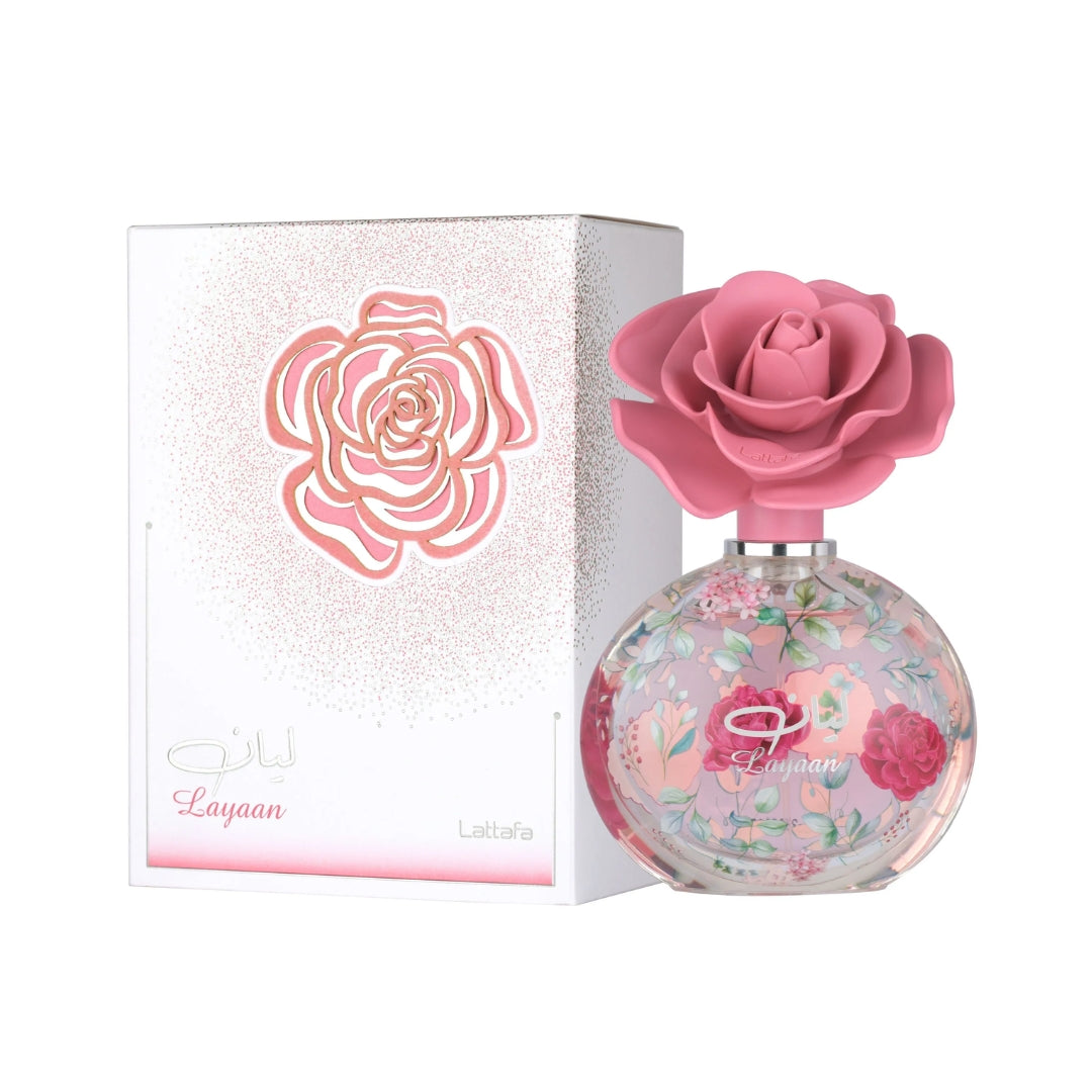 Layaan Perfume bottle with pink rose design and matching packaging box on a white background