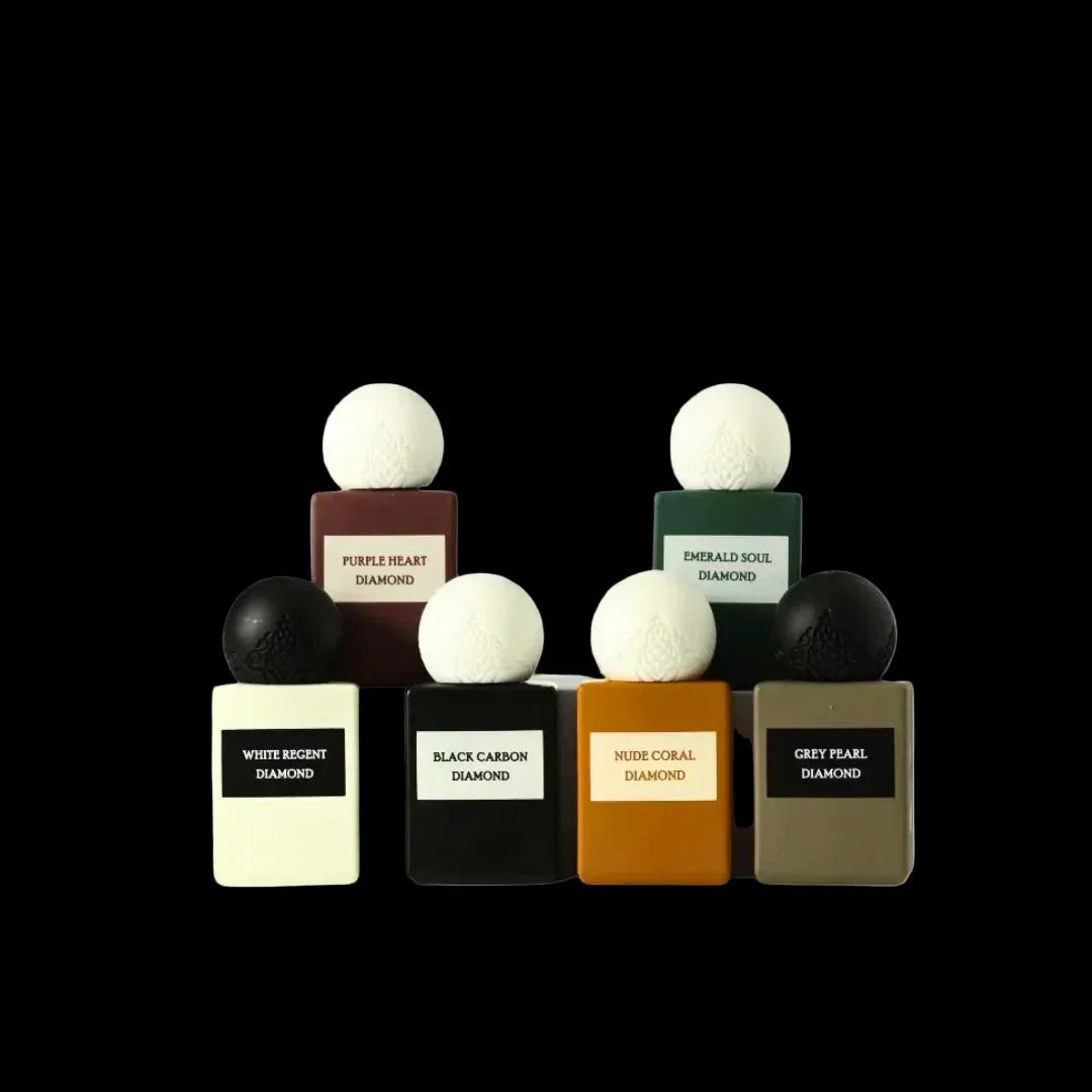 Mini Diamond Collection gift set with six assorted luxury perfume bottles on black background