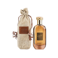 Mousuf brown Eau de Parfum bottle with gold cap and fabric drawstring pouch, luxury fragrance