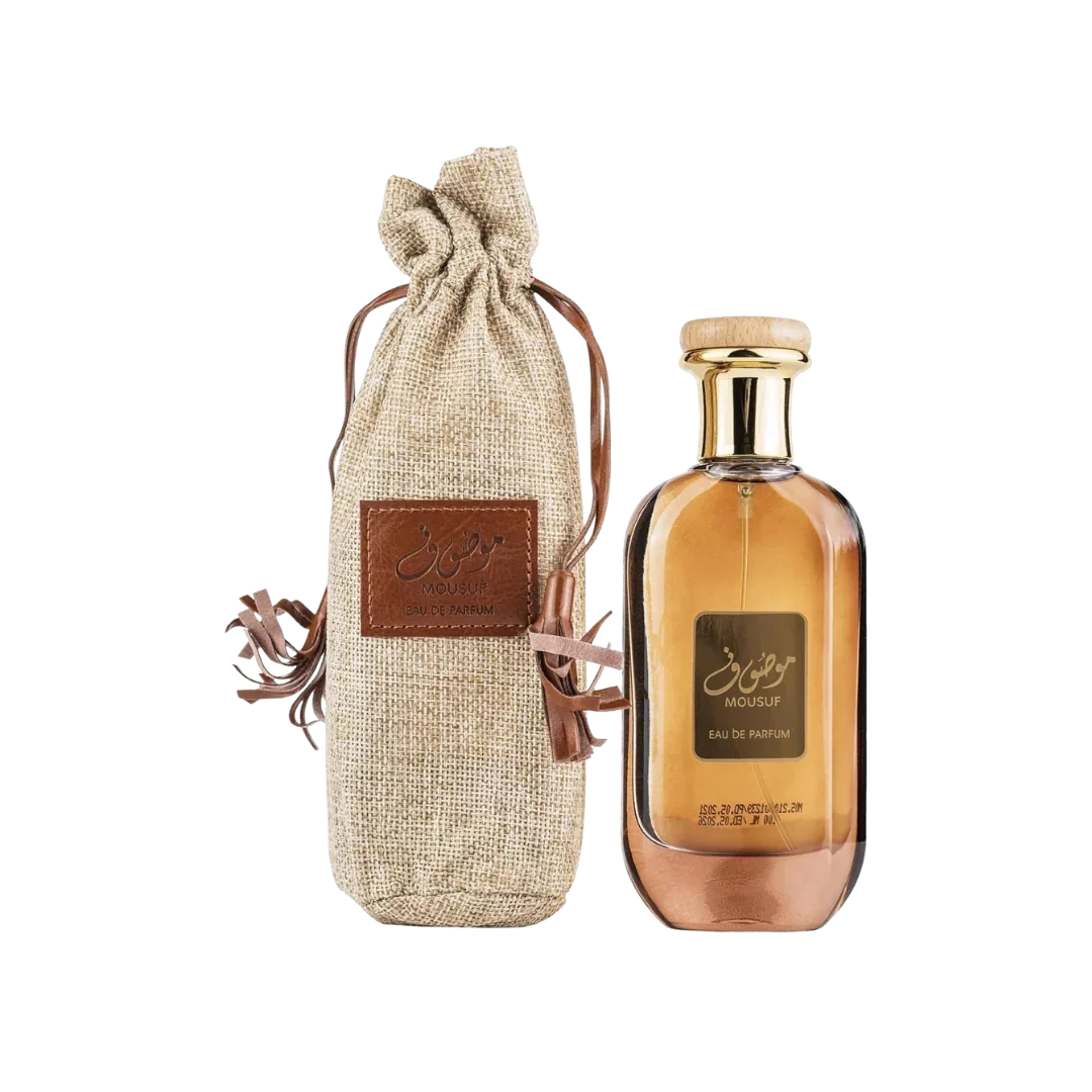 Mousuf brown Eau de Parfum bottle with gold cap and fabric drawstring pouch, luxury fragrance