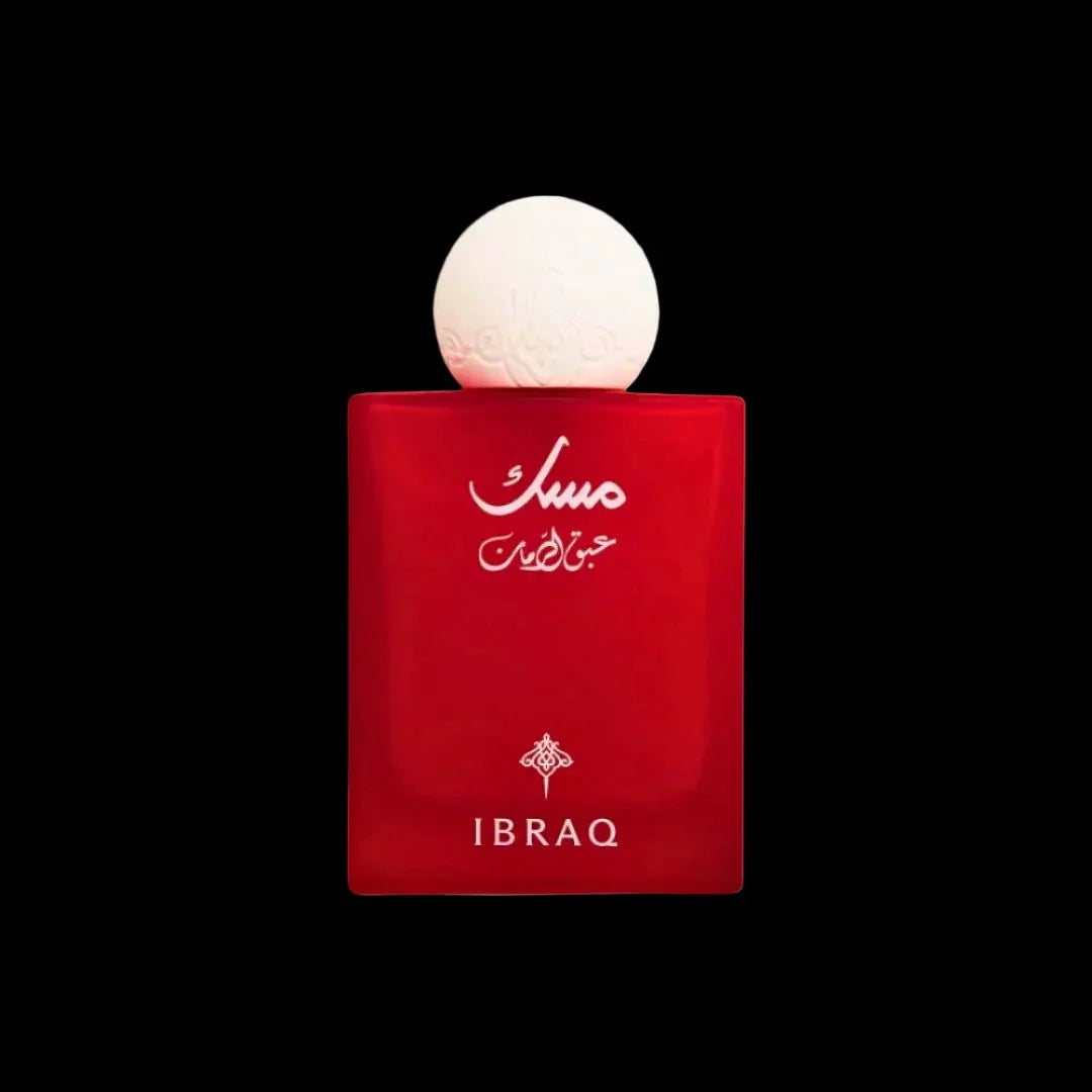 Red Ibraq perfume bottle with white round cap on black background, luxury fragrance