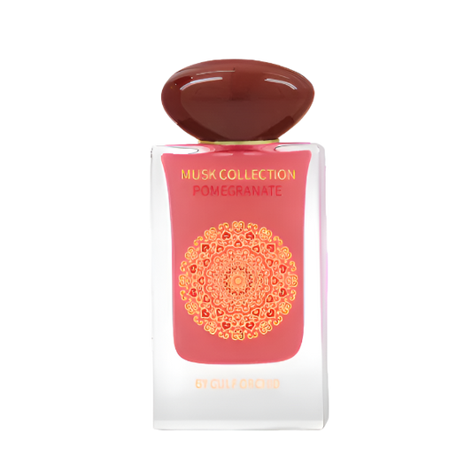 Musk Collection Pomegranate perfume by Gulf Orchid – elegant glass bottle with gold mandala design, surrounded by fresh ripe pomegranates, showcasing a fruity musk fragrance available at Parfum Zone Ke