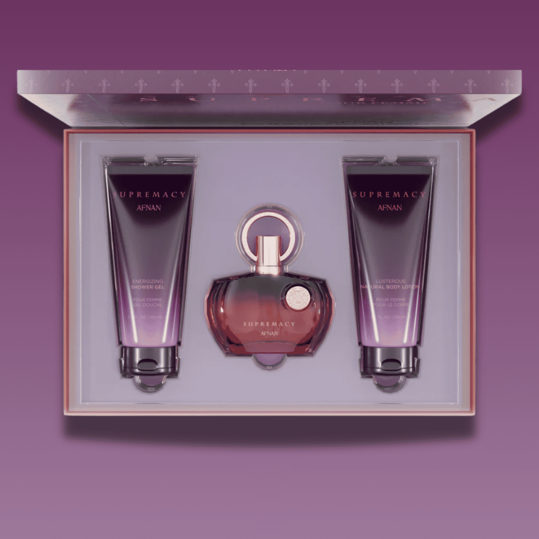 Afnan supremacy purple pour femme Perfume gift set with 100ml perfume, body lotion and shower gel in  a box on a purple background
