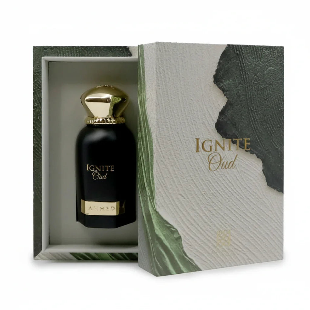 Luxury Ignite Oud perfume in black and gold bottle displayed in textured gift box.