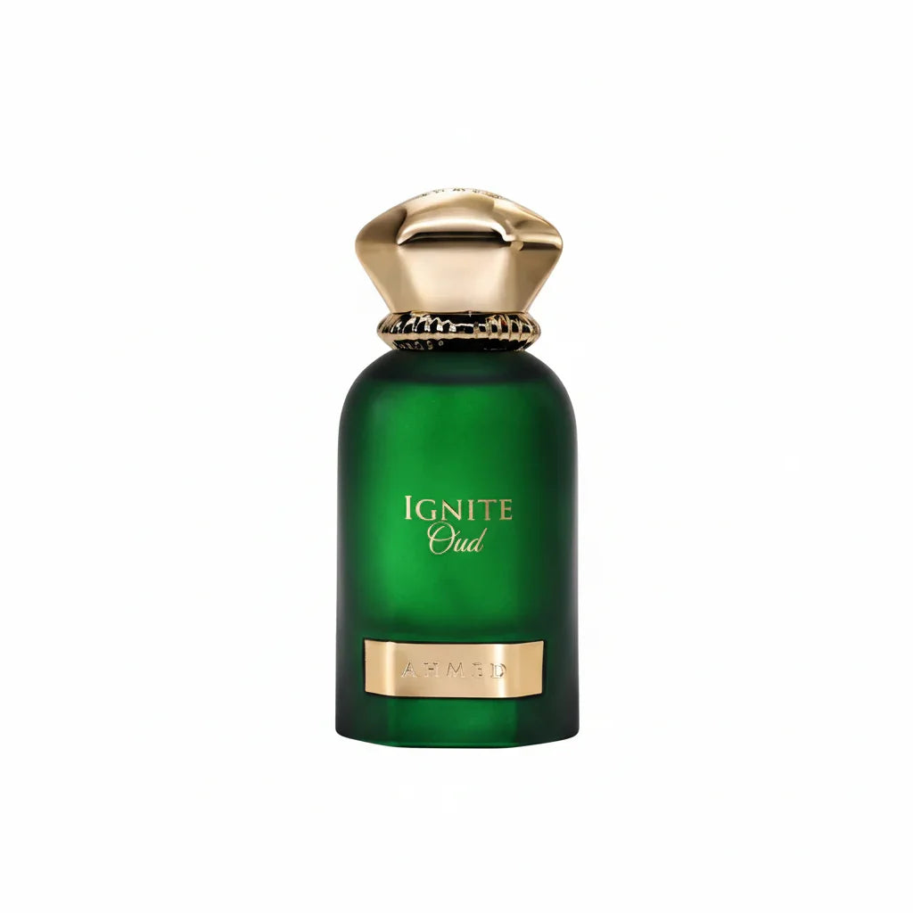 Green perfume bottle labeled Ignite Oud with gold cap on white background