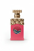 Pink perfume bottle with gold geometric cap, labeled Minya Caramel Dulce, on white background