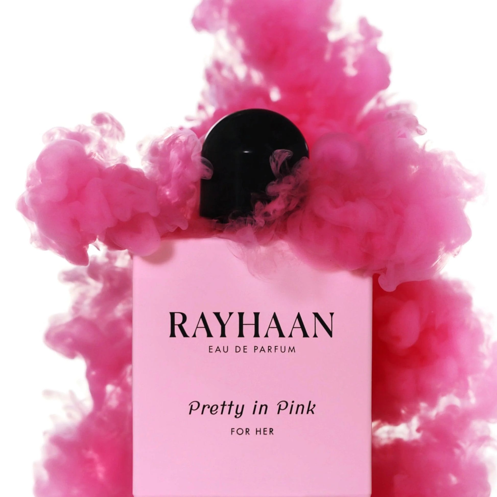 Elegant Pretty in Pink by Rayhaan Eau de Parfum bottle with rosy pink body and sleek black cap, showcased against a clean white background – a romantic floral gourmand inspired by Armani Si